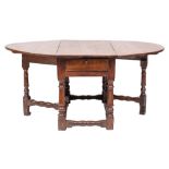 WITHDRAWN LOT A late 17th Century oak gateleg dining table:, with an oval hinged top,