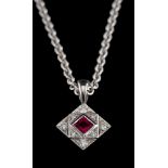 A ruby and diamond pendant by Victoria Buckley,