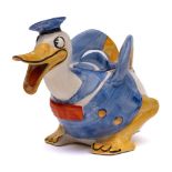 A Wadeheath 'Donald Duck' pottery teapot and cover: printed mark 'Wadeheath England by Permission