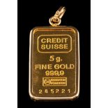 A gold pendant,: the rectangular pendant, stamped Credit Suisse, Fine Gold 999.