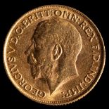 A George V gold sovereign,1914,: approximately 8g.