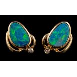 A pair of boulder opal and diamond earrings,: the oval shaped boulder opals in collet settings,