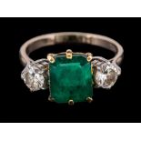 An emerald and diamond ring,