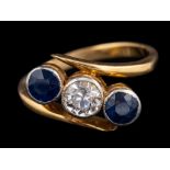 A sapphire and white sapphire ring,