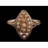 A late 19th century seed pearl ring:, the navette shaped panel set with seed pearls, stamped 15,