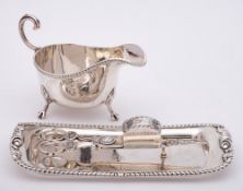 A George IV silver candle snuffer, maker Thomas Radcliffe, London,