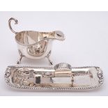 A George IV silver candle snuffer, maker Thomas Radcliffe, London,