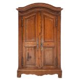 An Apprenticeman's beechwood armoire:, with a domed moulded cornice,