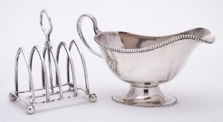 A George V silver pedestal sauceboat, maker Adie Brothers Ltd, Birmingham,