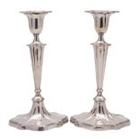 A pair of George V silver candlesticks, maker Goldsmiths & Silversmiths Co Ltd, London,