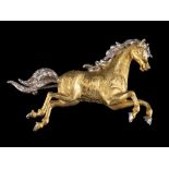 An 18 carat gold diamond horse brooch,: the horse set with eight cut diamonds to the forelock,