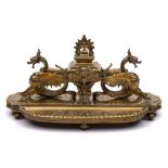 A large Italianate influence brass desk inkstand: of rectangular outline,