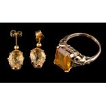 A citrine ring,: the rectangular cut citrine in a four claw setting,