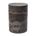 A Chinese pewter cylindrical tea canister: decorated with swallows and peony on a stippled ground,