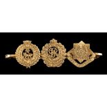 A military brooch,: the brooch with three regimental badges for the York & Lancaster Regiment,