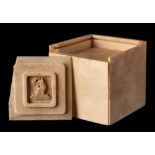 A 19th century ivory tangram (puzzle box): of square outline containing assorted sections,