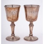 A pair of Elizabeth II silver goblets, maker W I Broadway & Co.