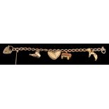 A 9 carat gold charm bracelet,: the curb link bracelet with various charms,