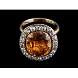 An orange topaz and diamond ring,: converted from a late 18th century brooch,