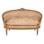 A carved and giltwood and velvet damask upholstered canapé in Louis XV / XVI Transitional style,