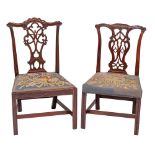 A George III carved mahogany dining chair: the back with shaped arched top rail with gadrooned and