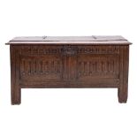 A late 17th Century oak rectangular coffer:, with a plain hinged top,