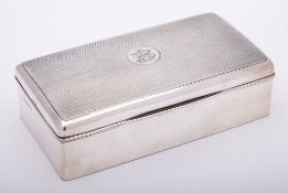 A George V silver cigarette box, maker George Unite & Sons, Birmingham, 1924: monogrammed,