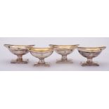 A set of four George III silver pedestal salts, maker Robert Hennell I & David Hennell II, London,