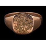 A 9 carat gold signet ring,: the panel engraved with a monogram,