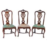 A set of six 18th Century Portuguese carved rosewood dining chairs:,