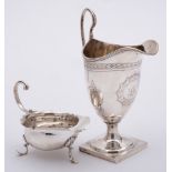 A late Victorian silver cream jug, maker's mark worn, Chester, 1905: monogrammed,