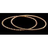 A 9 carat gold bangle,: of ropetwist design, stamped 375 with full London hallmarks, 6.
