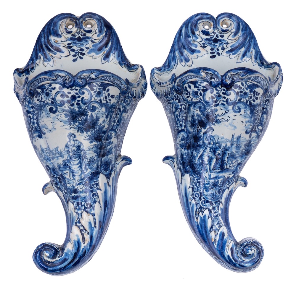 A pair of large Dutch blue and white delftware cornucopiae wall pockets: in 18th century style,