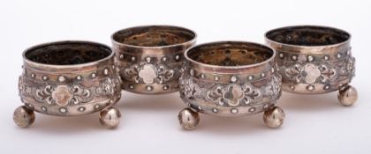 A set of four Victorian silver salts, maker Thomas Smily, London, 1876: of circular outline,
