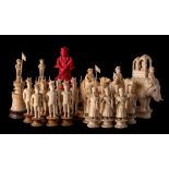A collection of early 19th century East India 'John Company' ivory chess pieces and one other: