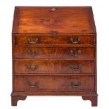 A George III mahogany bureau:,