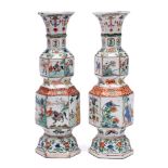 A pair of Chinese famille verte hexagonal section double-gourd vases: painted with alternating