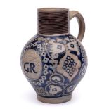 A large German Westerwald grey stoneware jug: of globular form with cylindrical ribbed neck,