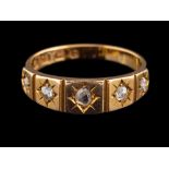 A late Victorian 18 carat gold and diamond ring,: set with five rose cut diamonds,