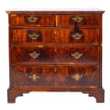 An early 18th Century walnut and crossbanded rectangular chest:, with a quarter veneered top,