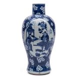 A Chinese blue and white baluster vase: painted with lotus shaped panels depicting an attendance