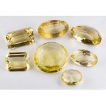 Seven unset citrines,: the vari cut citrines approximately 219.00 carats total.
