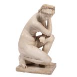 A sculpted white marble Grand Tour model of the Crouching Venus,