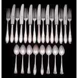 A small collection of assorted Continental silver flatwares: includes eight dessert forks,