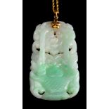 A jadeite pendant,: the carved pendant, on a 14 carat gold chain, stamped 14k,