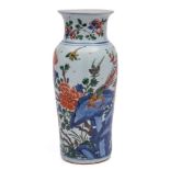 A Chinese wucai sleeve vase: of shaped cylindrical form with flared rim,