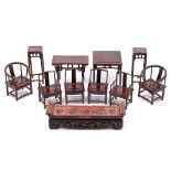 A collection of Chinese hardwood and lacquer miniature furniture and stands: comprising a pair of