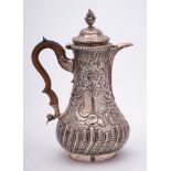 A George III silver coffee pot, maker I.W over T.