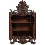 A 19th Century carved oak hanging open cabinet:,