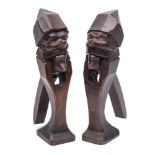 A pair of Bavarian carved and stained wood nutcrackers modelled as gnomes, circa 1900,